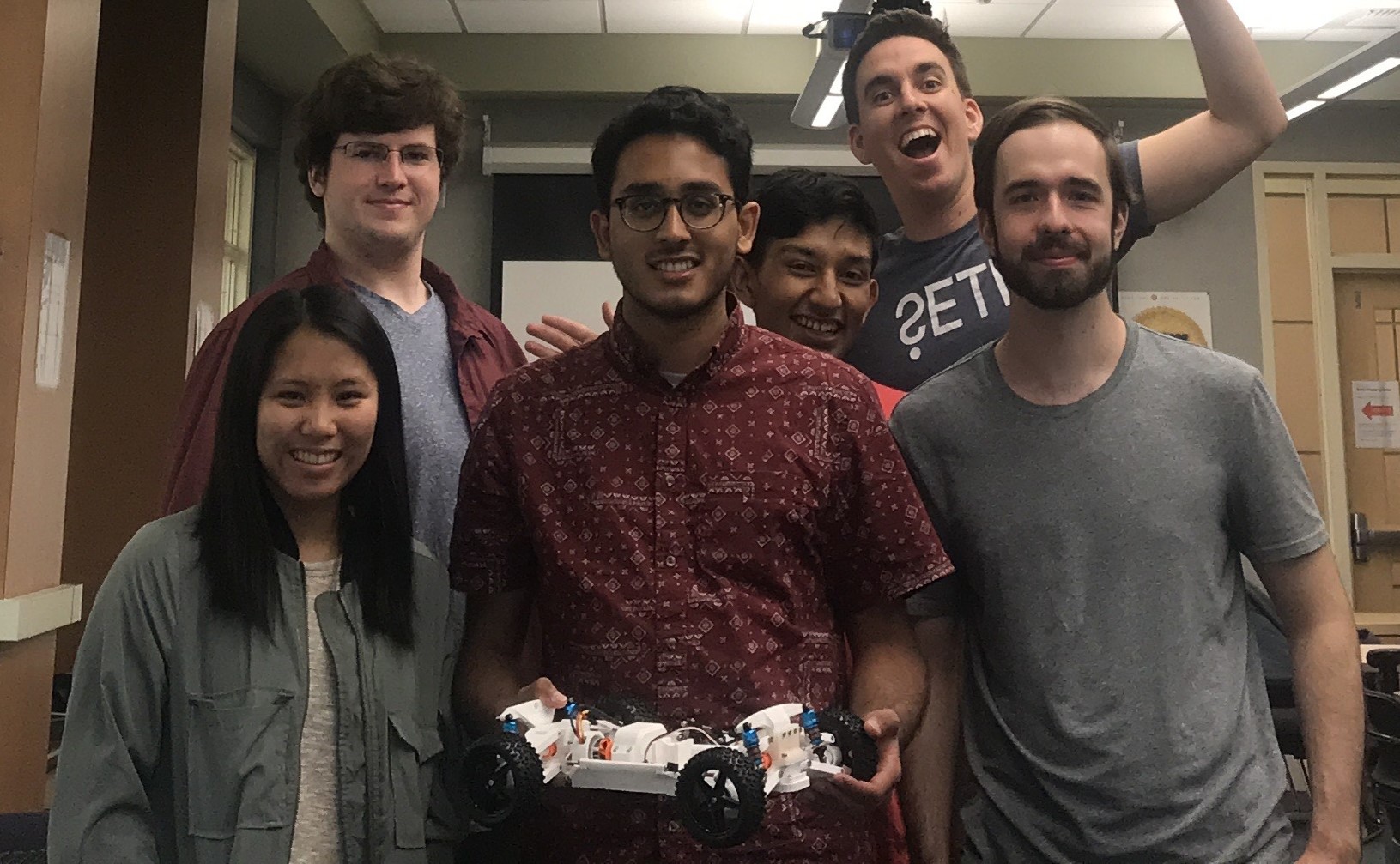 Team working on self-driving car